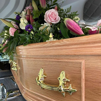 Wood Effect, Veneer & Solid Coffins from female led Barringtons Funeral Directors based in Bishops Stortford,